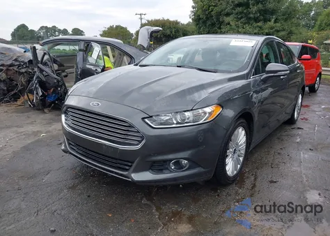 2015 Ford Fusion Energi Se Luxury z USA, uszkodzony, nr VIN 3FA6P0PUXFR168130
